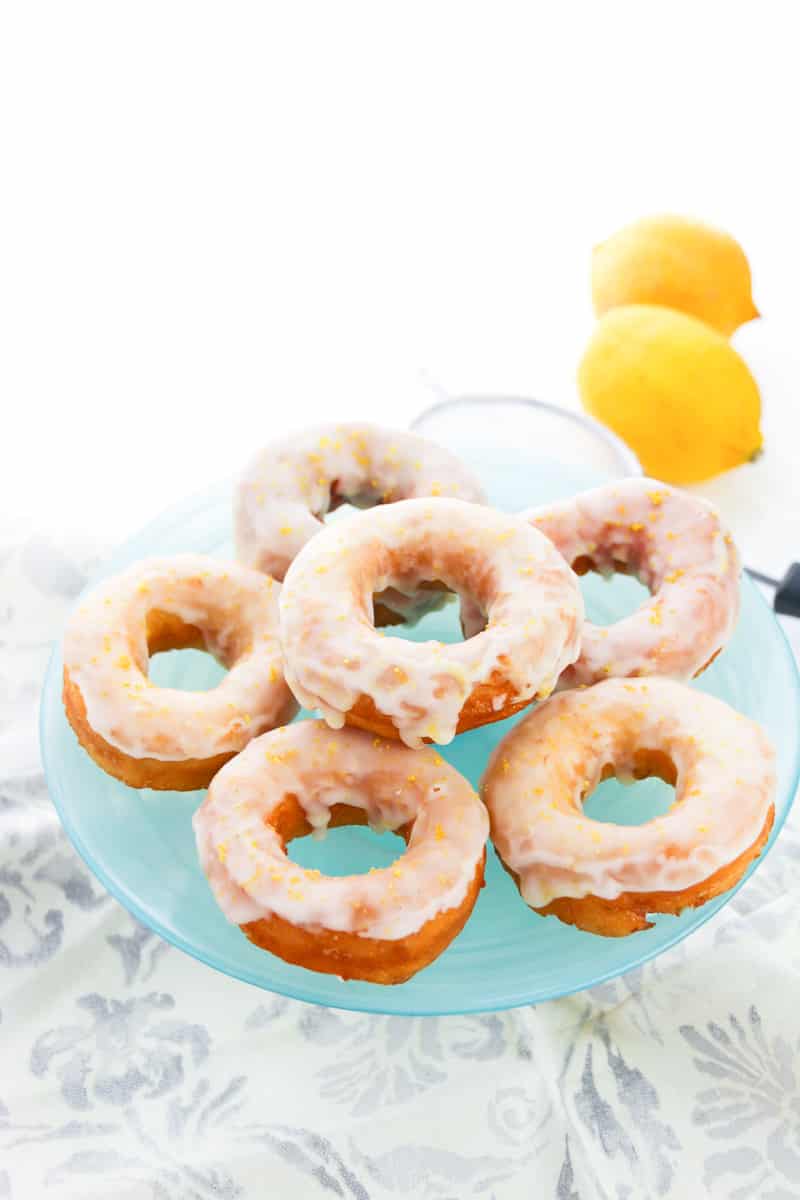 biscuit donuts stacked on blue plate